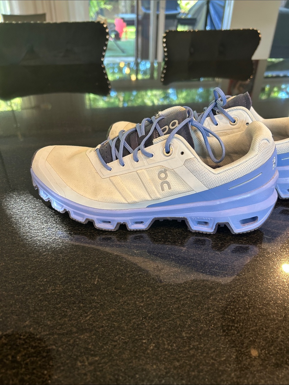 On Running Women's Athletic Shoes in White and Light Blue